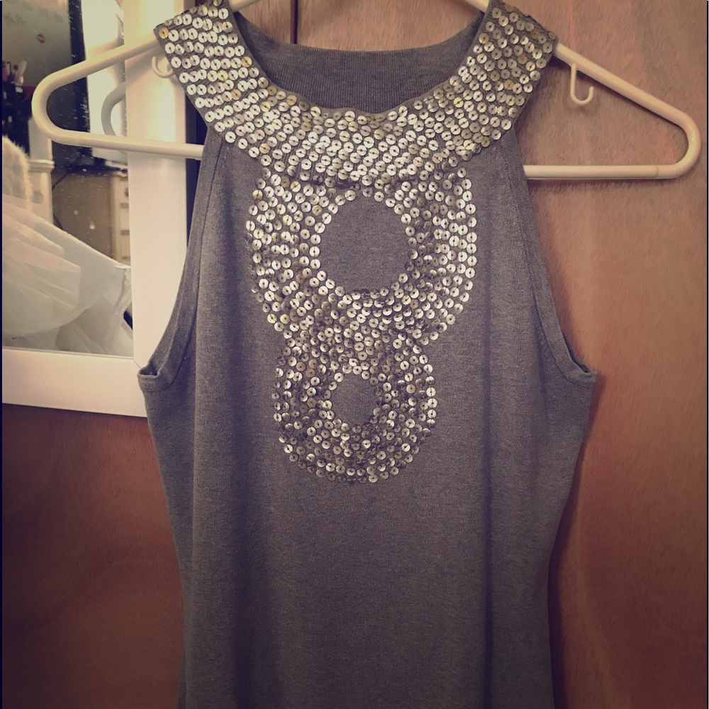 A grey thick blouse in great condition.